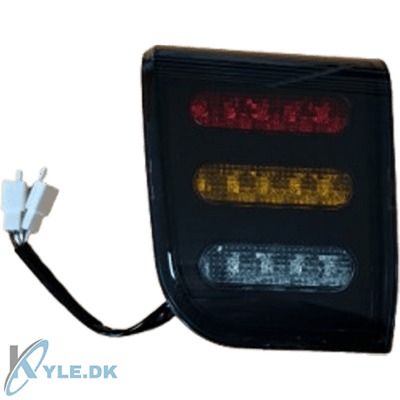 Venstre baglygte til Bach Cargo med røgfarvet glas.